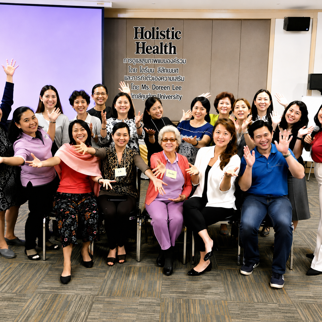 Doreen Lee facilitating a personal development and holistic wellness workshop, engaging participants in personal development.